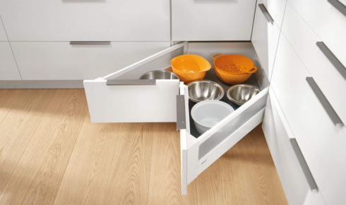 How can adding a narrow shelf in a dead corner make it more useful