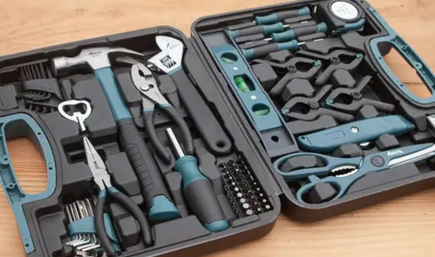 How can keeping a basic tool kit at home cut down on minor repair costs