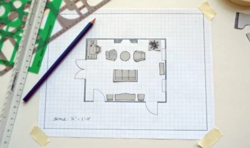 Why might drawing your room layout on paper before buying furniture save money and effort